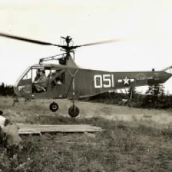 Wooden platforms are constructed to prevent the helicopters from sinking into the bog